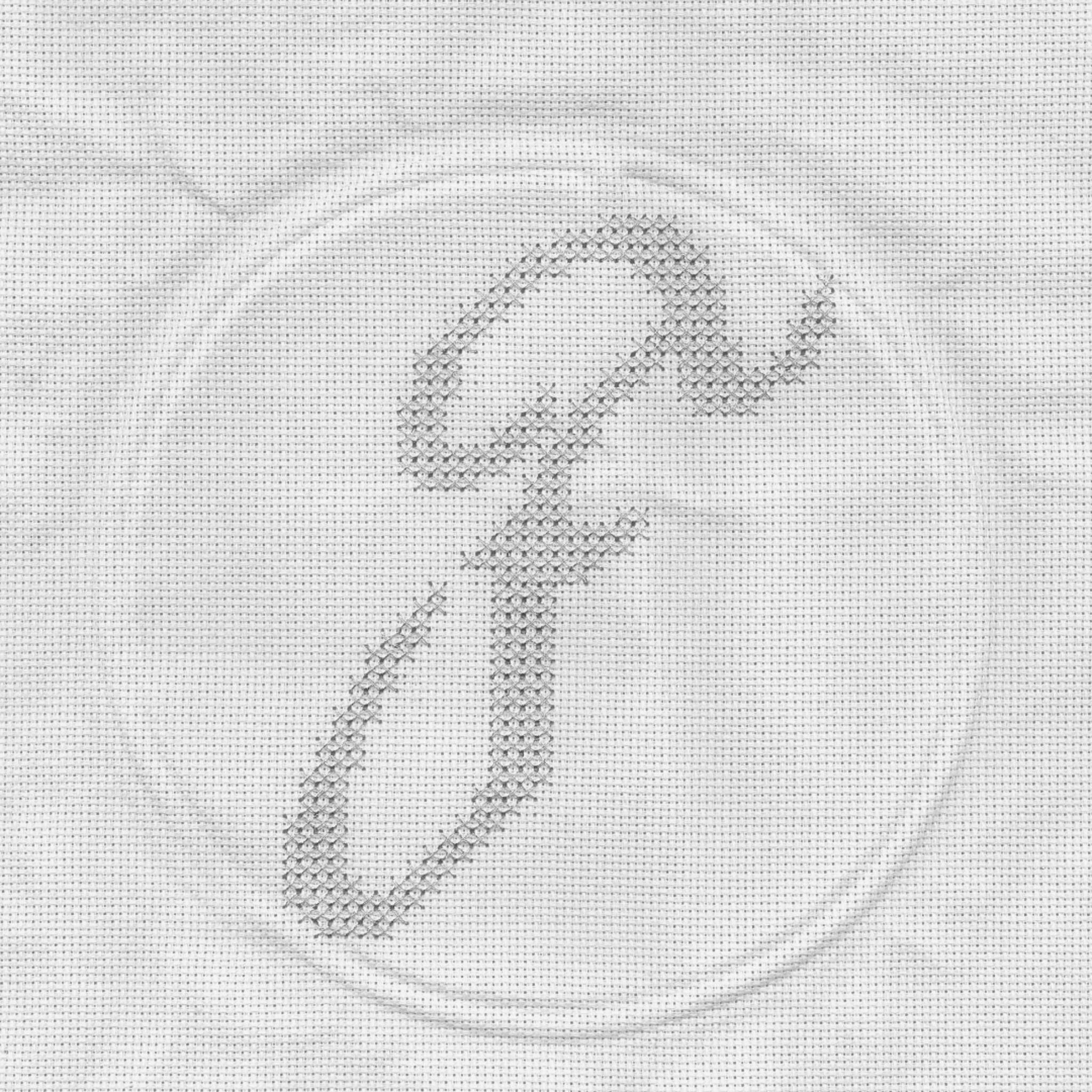 cross-stitched letter F
